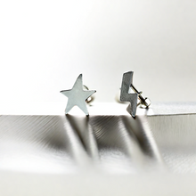 Sterling silver star and bolt ear studs