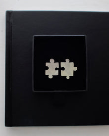 Sterling silver jigsaw puzzle ear studs