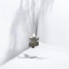 Sterling silver jigsaw puzzle necklace
