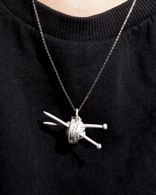 Sterling silver woollen ball with needles