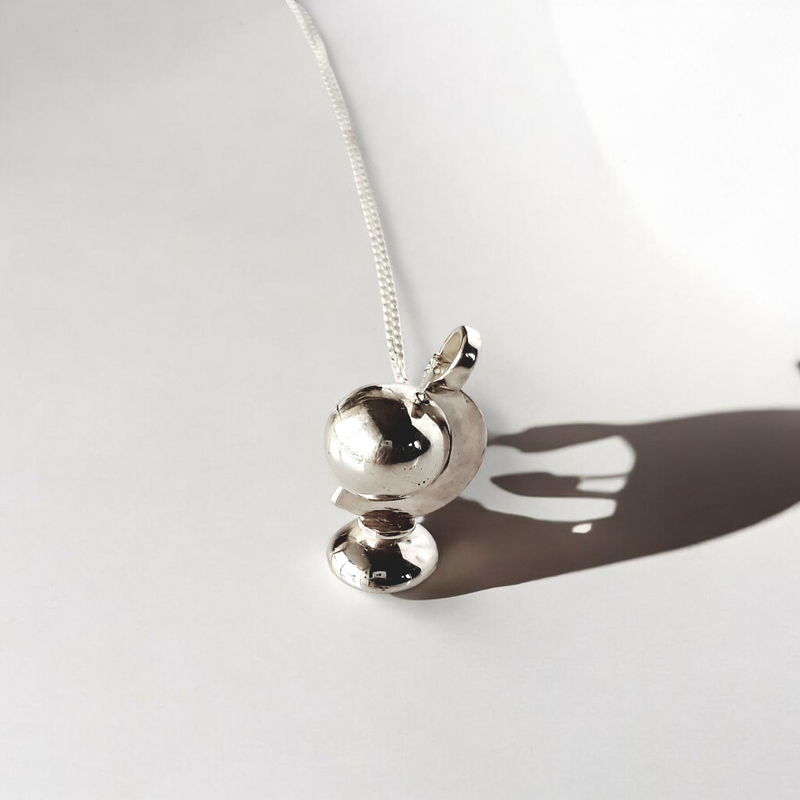 Sterling silver spinning globe necklace