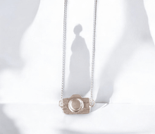 Sterling silver camera necklace - Saw Framed