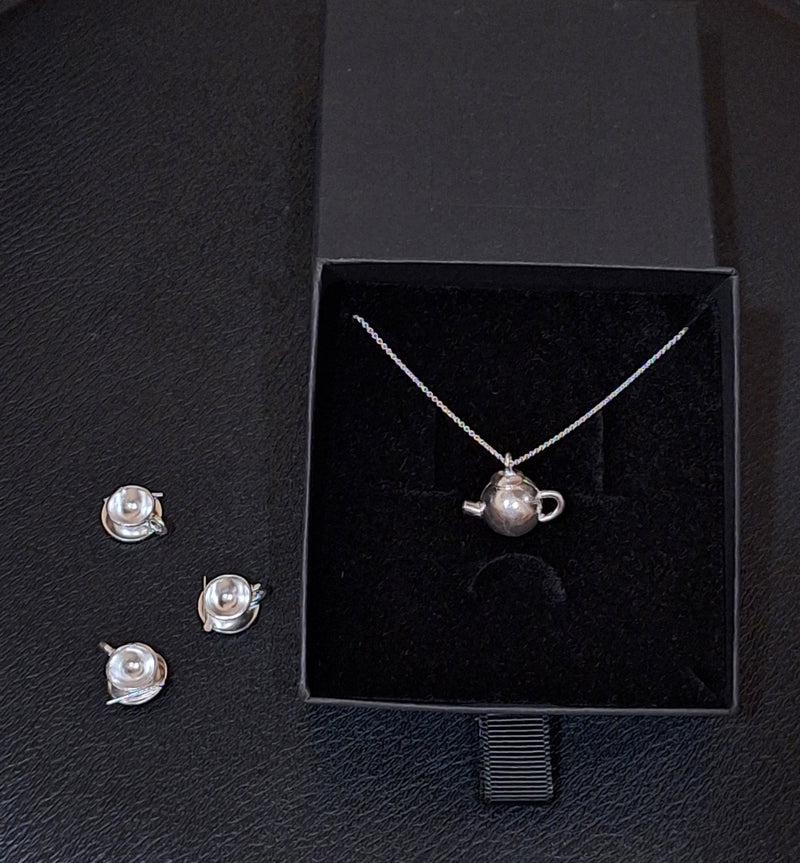 Sterling silver cup and saucer necklace - Saw Framed