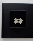 Sterling silver jigsaw puzzle ear studs - Saw Framed