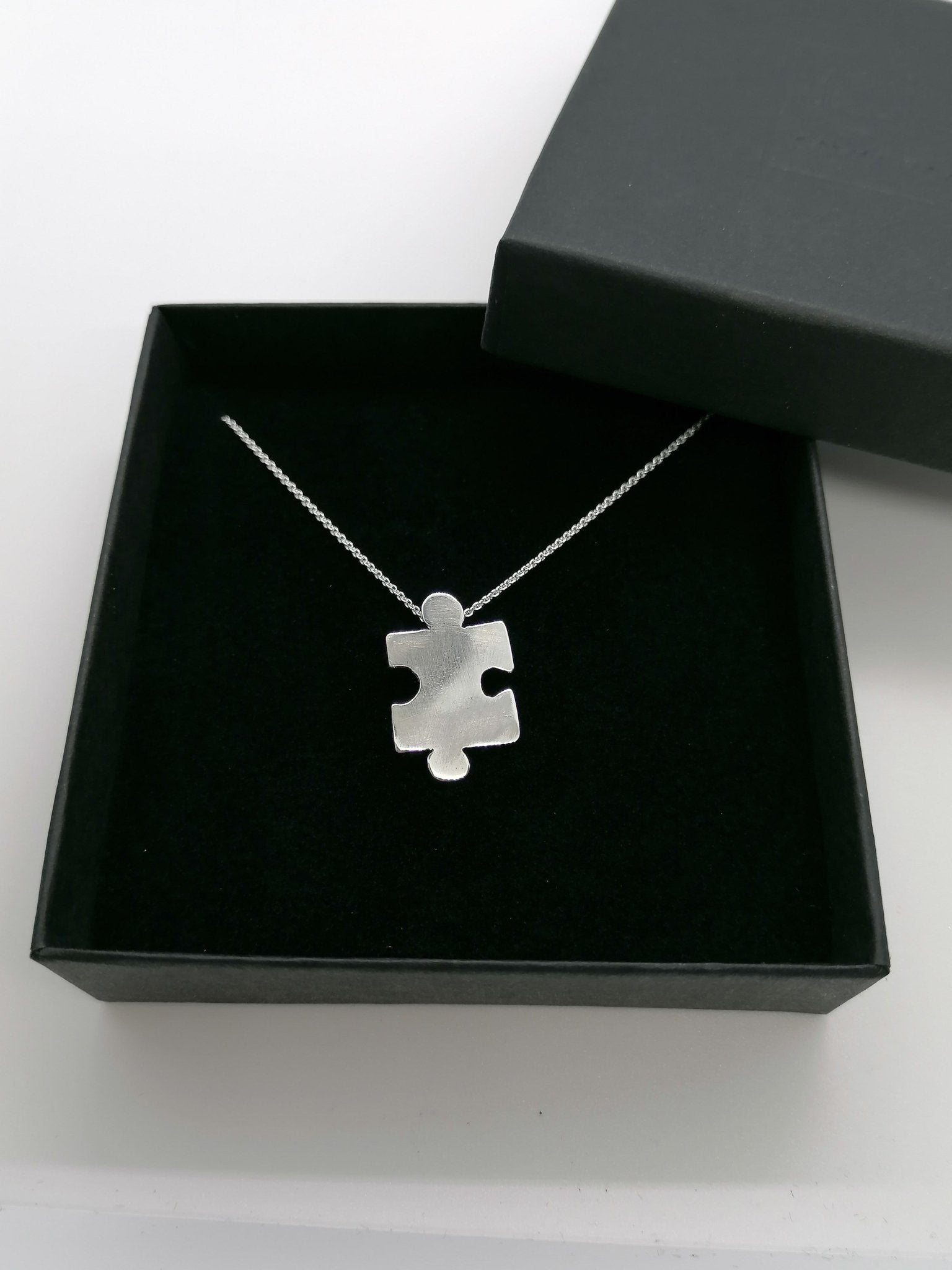 Sterling silver jigsaw puzzle necklace - Saw Framed
