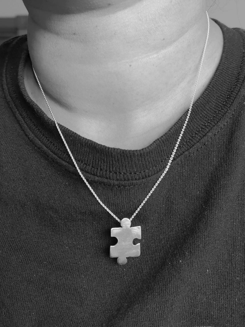Sterling silver jigsaw puzzle necklace - Saw Framed