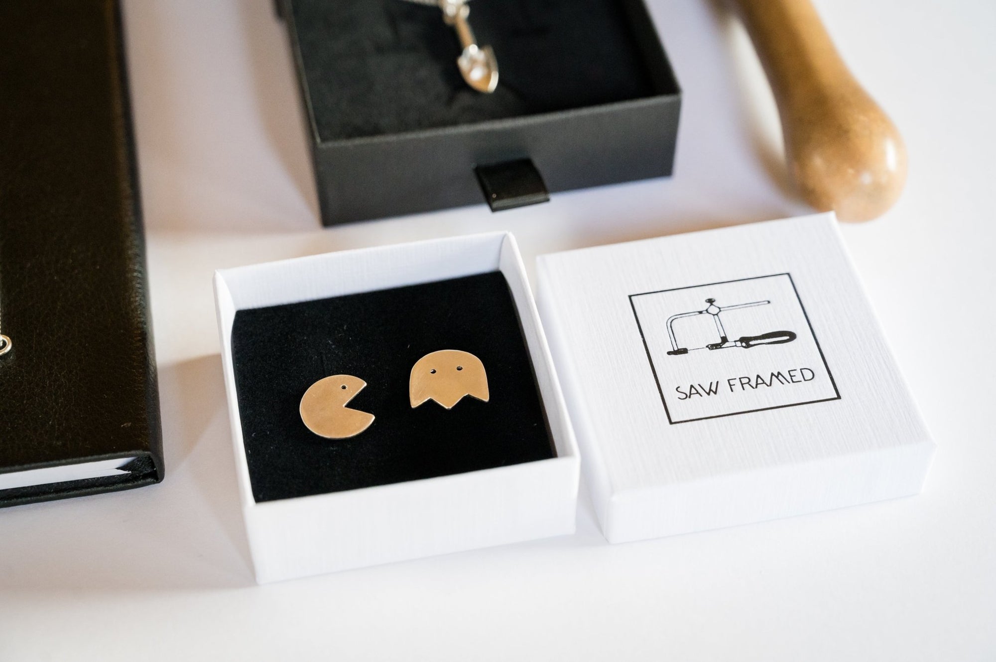 Sterling silver mis-matching Pacman ear studs - Saw Framed