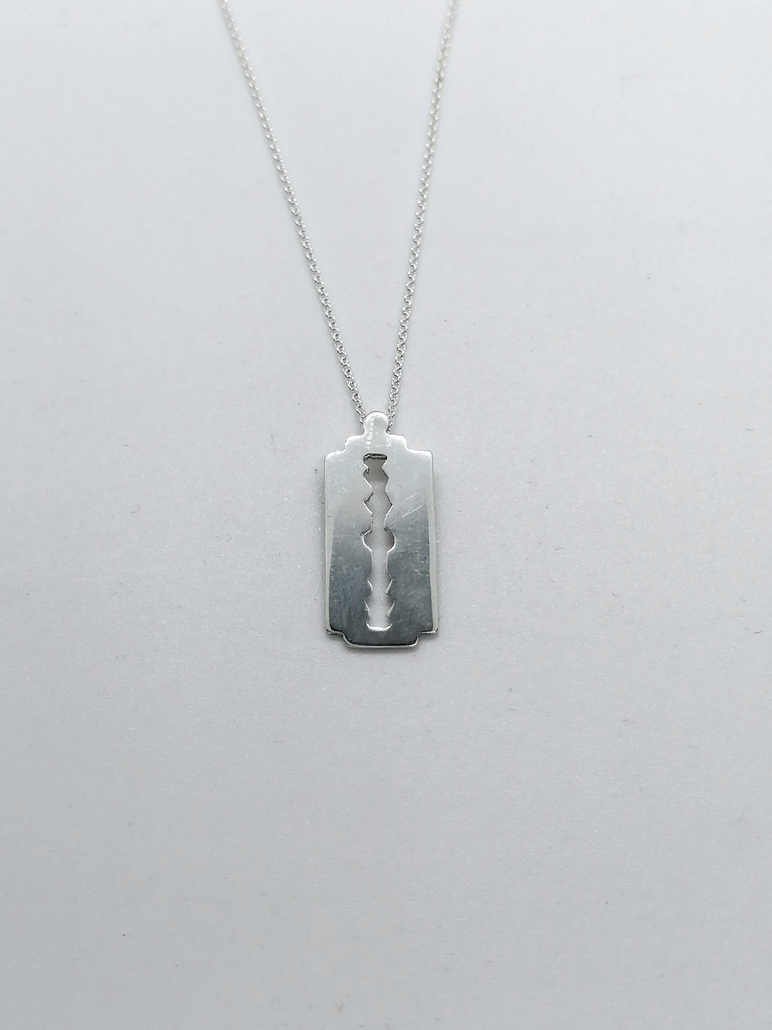 Sterling silver razor blade necklace - Saw Framed