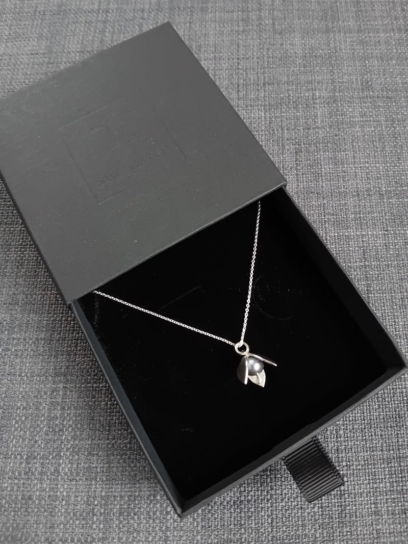Sterling silver snowdrop necklace - Saw Framed