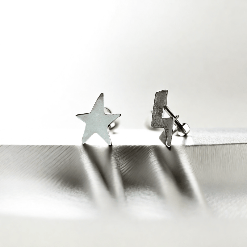 Sterling silver star and bolt ear studs - Saw Framed