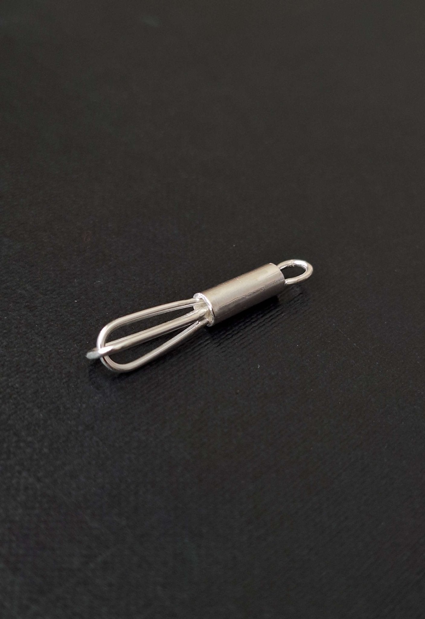 Sterling silver whisk necklace - Saw Framed