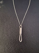 Sterling silver whisk necklace - Saw Framed
