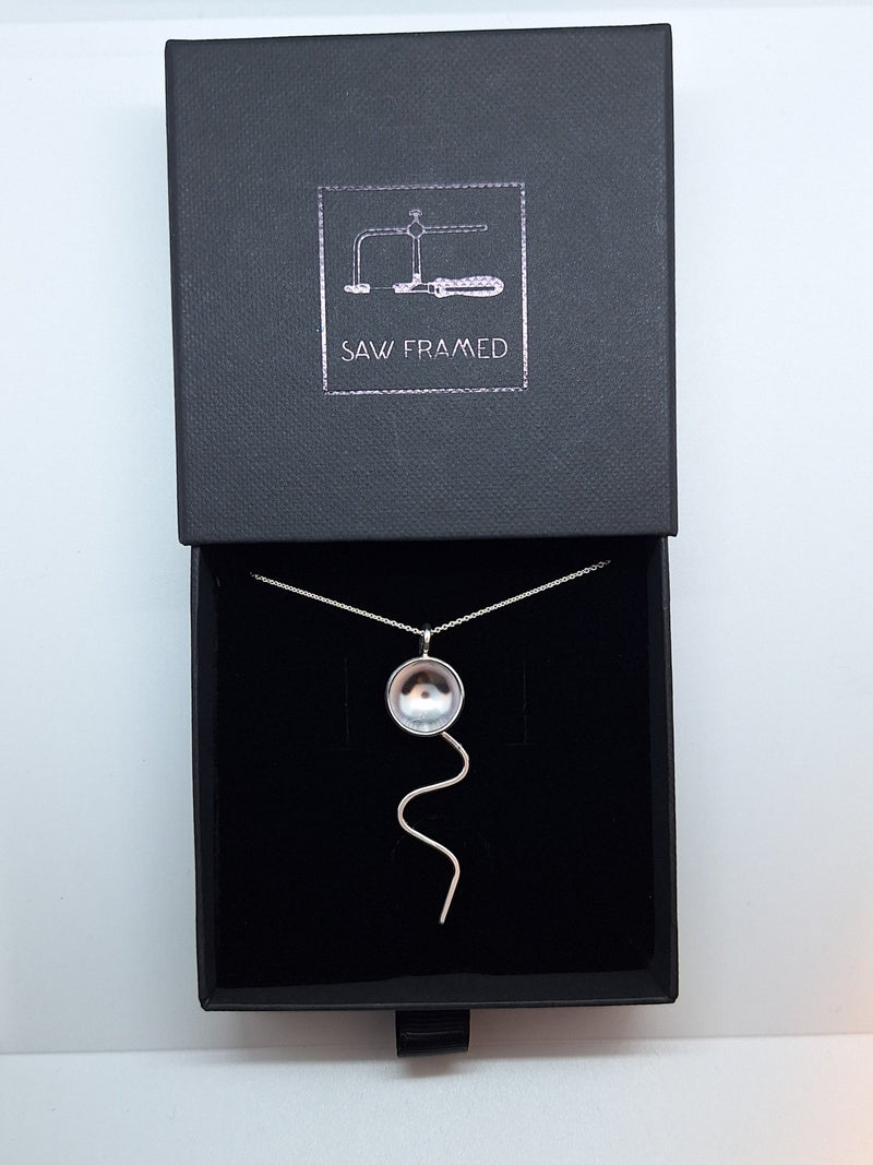 Sterling silvery jellyfish necklace - Saw Framed
